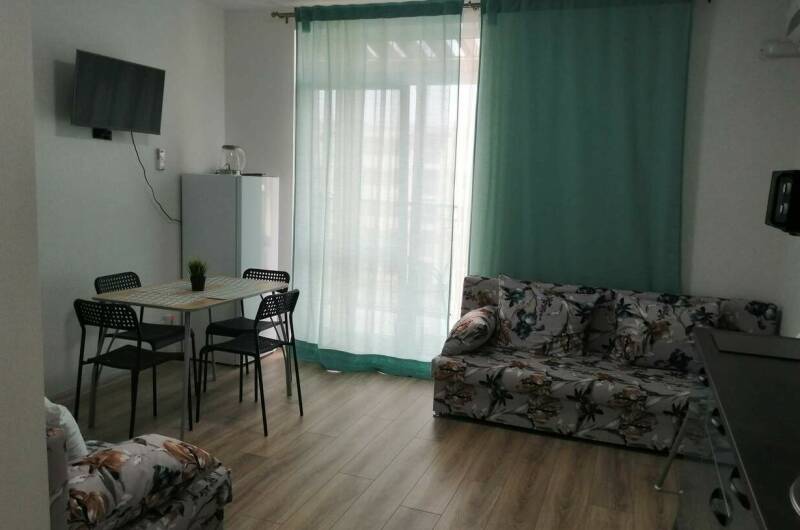 Студия «Мария» с бассейнами во дворе